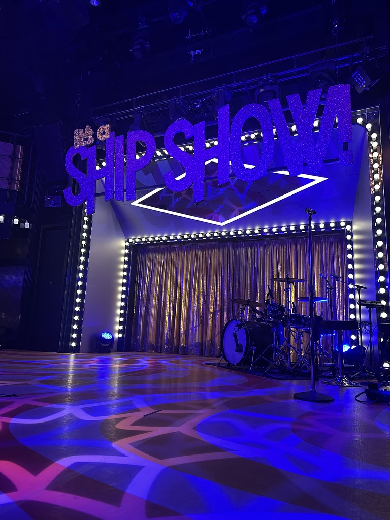 The Manor's neon 'It's a Ship Show!' stage sign